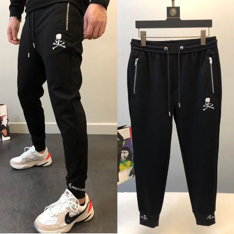 

2022 MMJ embroidered skull trousers MASTERMIND letter men's small feet casual sports cotton sweatpants KZ774