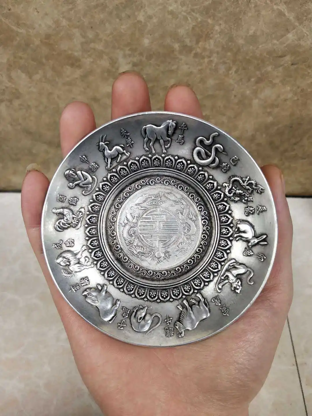

Antique miscellaneous items, retro and vintage, silver plated with twelve zodiac signs, silver inlaid with silver dollar plates,