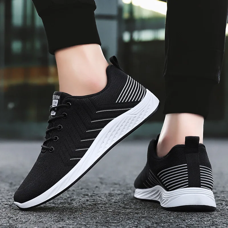 New wholesale student flying woven breathable trend black casual soft bottom lace-up breathable sneakers for brilliant men