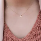 Ожерелье-чокер с подвеской в виде букв золотого и серебряного цвета