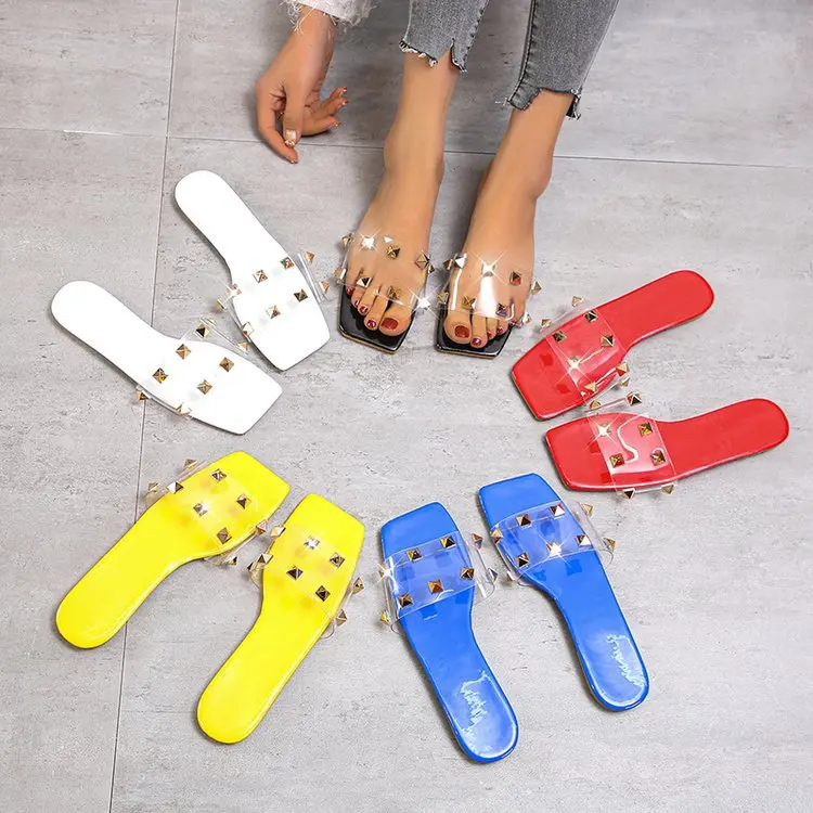 

New Summer Women's Shoes One Line Transparent Women's Sandals Square Head Flat Bottom Large Slippers Rivet Women's Slippers