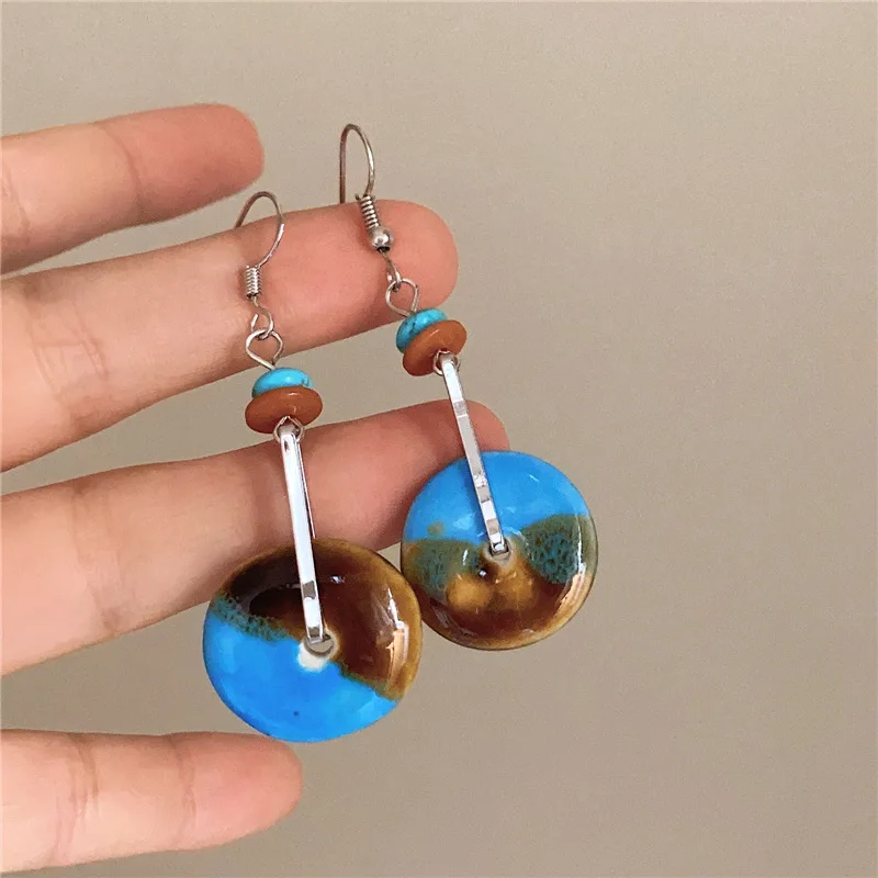 Серьги-гвоздики в европейском и американском стиле с синими камнями