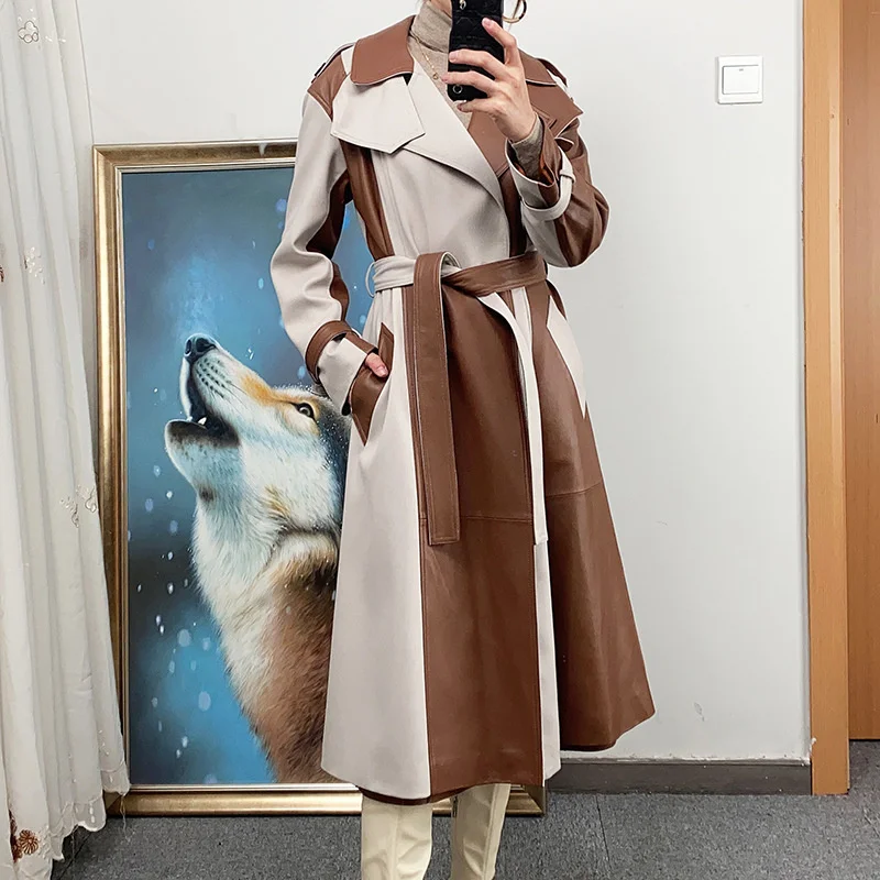 

2023 autumn and winter new black and white stitching long leisure belt waist fashion windbreaker leather sheep leather women