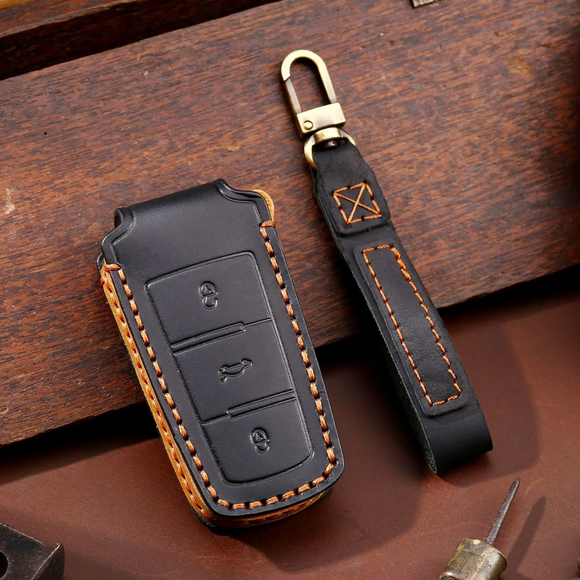 

Suitable for Volkswagen key cover old Maiteng b7 special 13 Volkswagen cc key cover high-end leather protection buckle cover