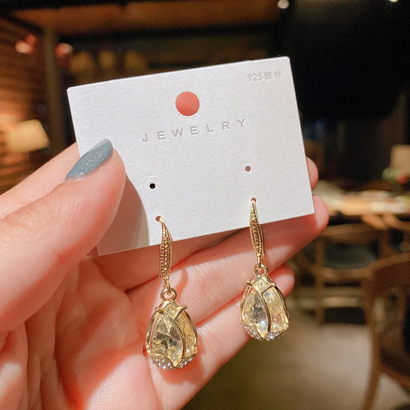 

Rhinestone Pendant Earrings Crystal Inlaid Earrings сережки Gold Color Ear Hook Earrings White Stone Earrings Jewelry for Women