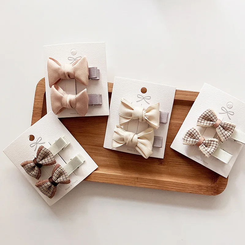 

2pcs Baby Girls Bows Hairpins College Sweet Plaid Headwear Cute Fabric Child All-Inclusive Hair Clips Bangs Side Clip Headdress