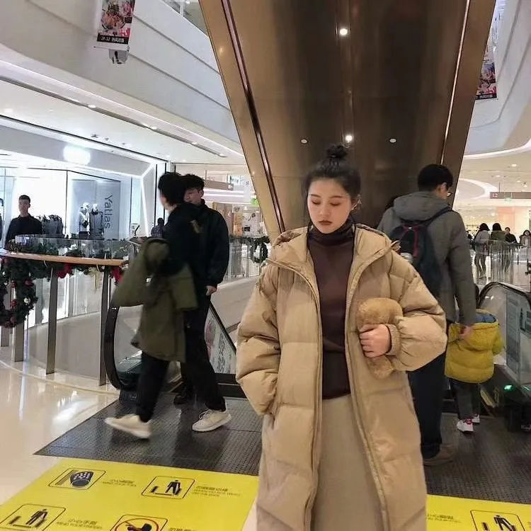 2022 Autumn Winter New Hooded Loose Down Jacket Womens Middle and Long Jiangnan White Duck Down Jacket Tide Womens Coat