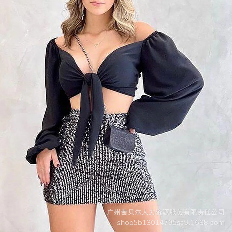 

Женский костюм из 2 предметов, короткий топ с рукавами-фонариками и юбка с блестками