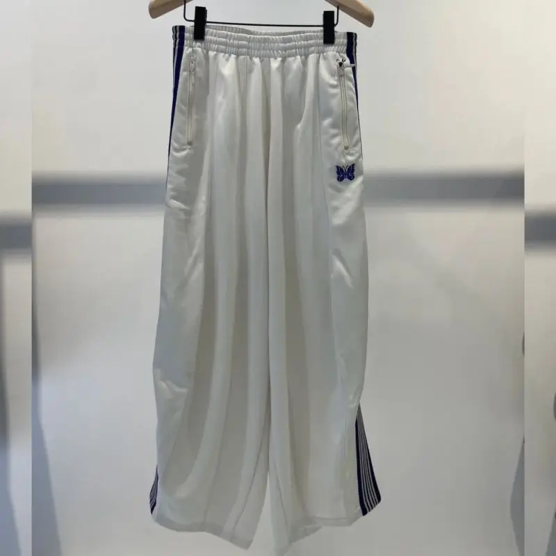 

Брюки мужские/женские с широким подолом и вышивкой «бабочка»