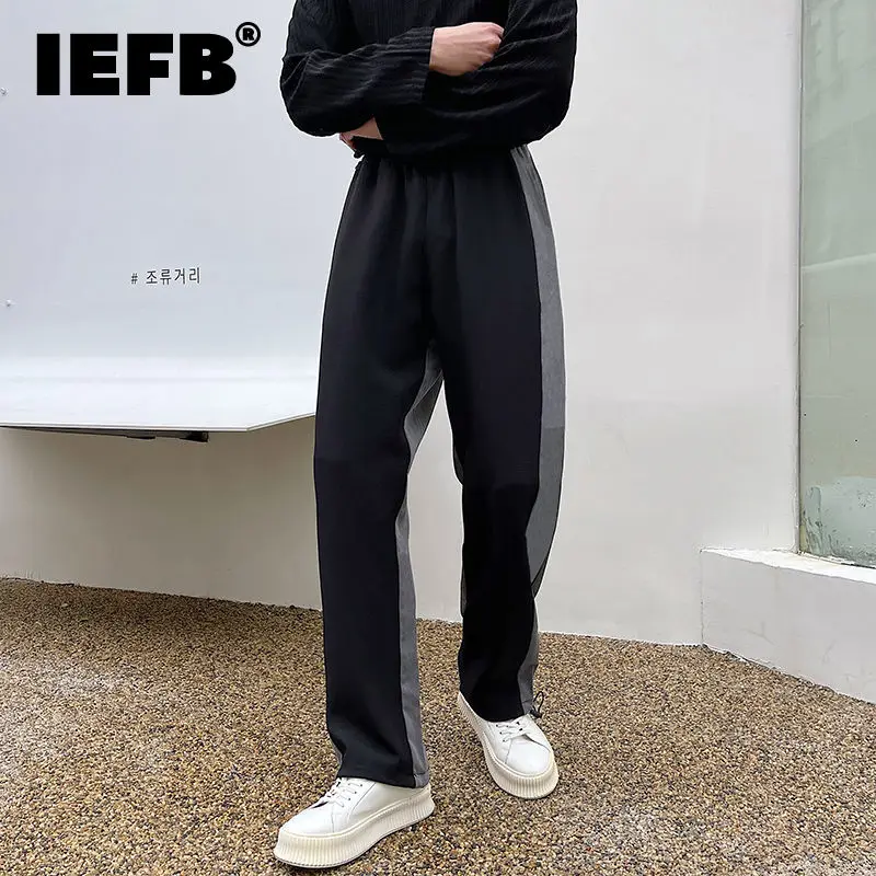 

IEFB весенние Ummer корейский шнурок спортивные брюки мужские свободные прямые цветные блокированные широкие брюки модные повседневные брюки ...
