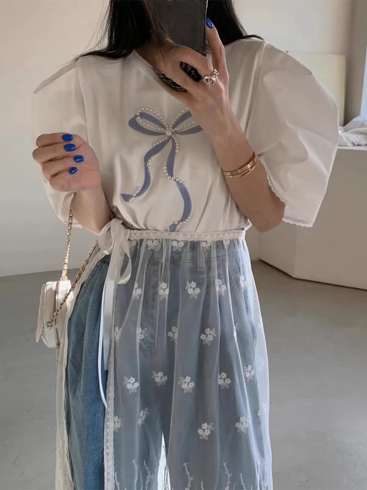 Женская летняя футболка с рукавами-фонариками и бантом