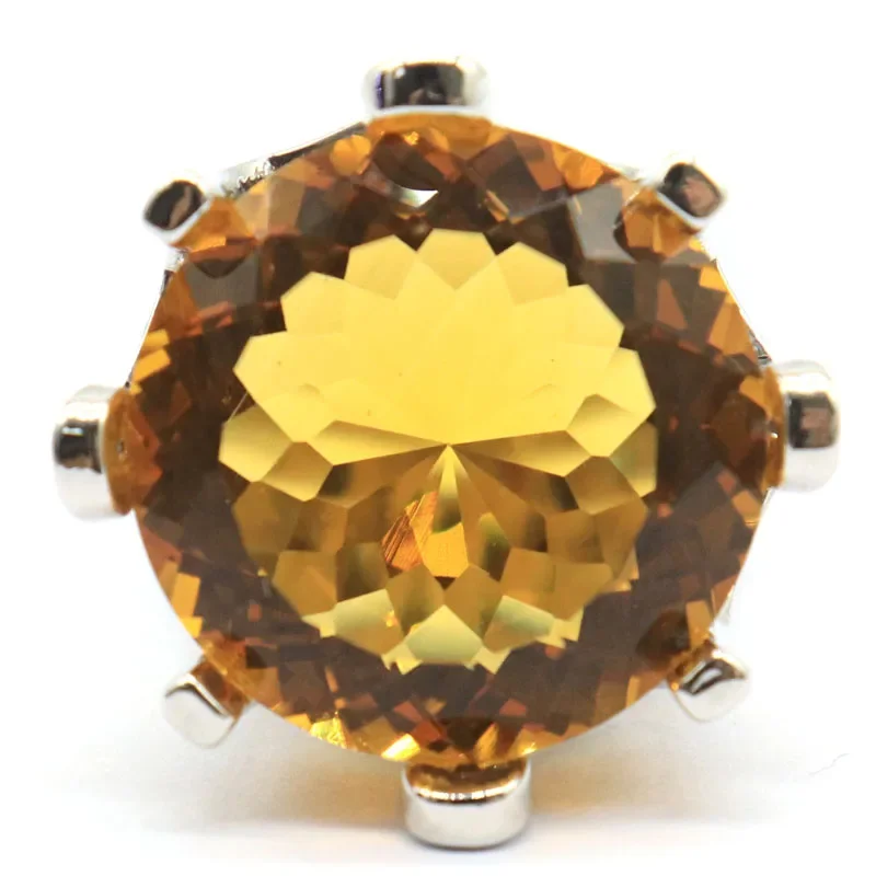 

Кольцо из серебра 925 пробы с аквамарином, зеленым хризолитом и Рубином