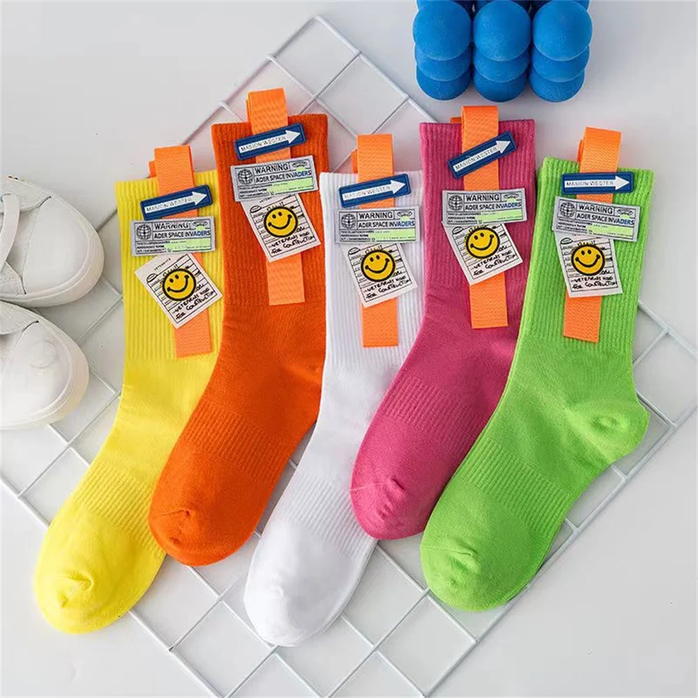 Cartoon smiling face fashionable fluorescent color medium tube socks Street hip hop basketball skateboard socks four seasons