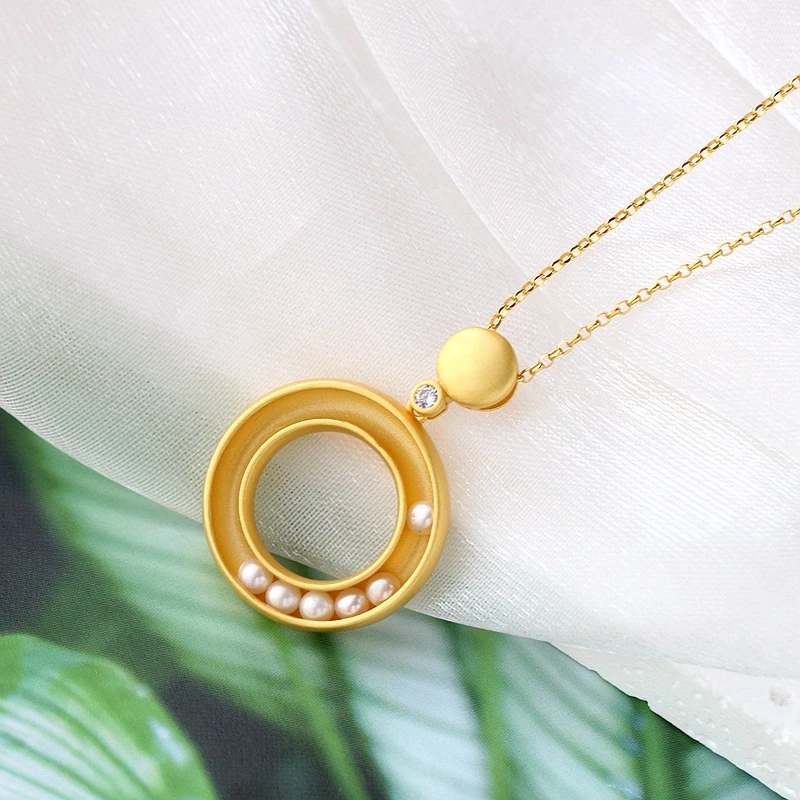 Кулон кольцевой из серебра 925 пробы с натуральным жемчугом