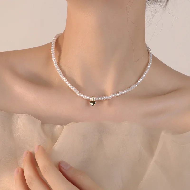 

2023 French retro pearl love beaded necklace ladies light luxury lady wind collarbone chain irregular love pendant necklace