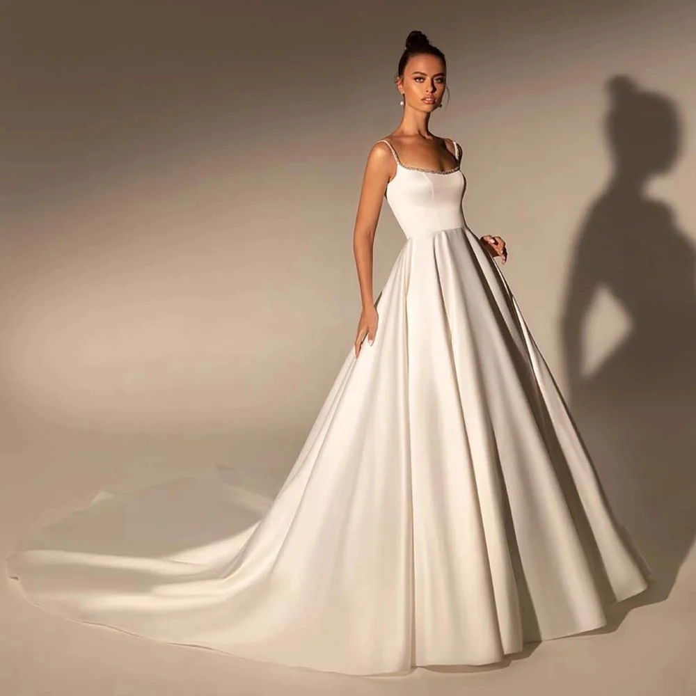 

Elegant Wedding Dresses for Women 2023 Bride Beading Spaghetti Straps Wedding Gown Long White Sleeveless Ball Gown Bridal Dress