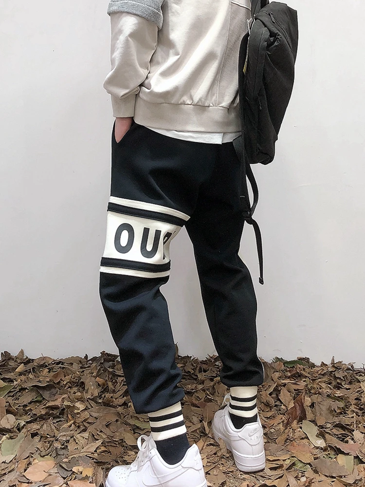 2022 Korean Style Hip Hop Fashion Sweatpants Kpop Letter Print Couple Splicing Casual Sports Jogging Pants Harajuku Joggers Men |
