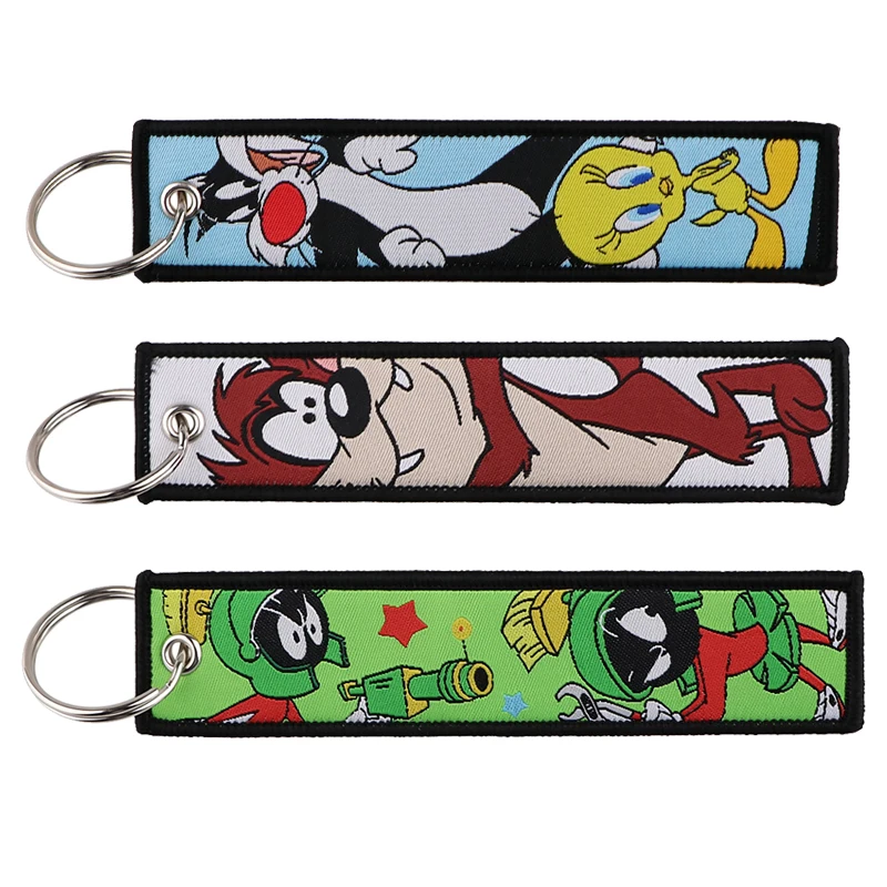 

Американский мультяшный милый вышитый брелок для ключей, брелок для женщин, японские аниме автомобильные ключи, модные ювелирные изделия, а...