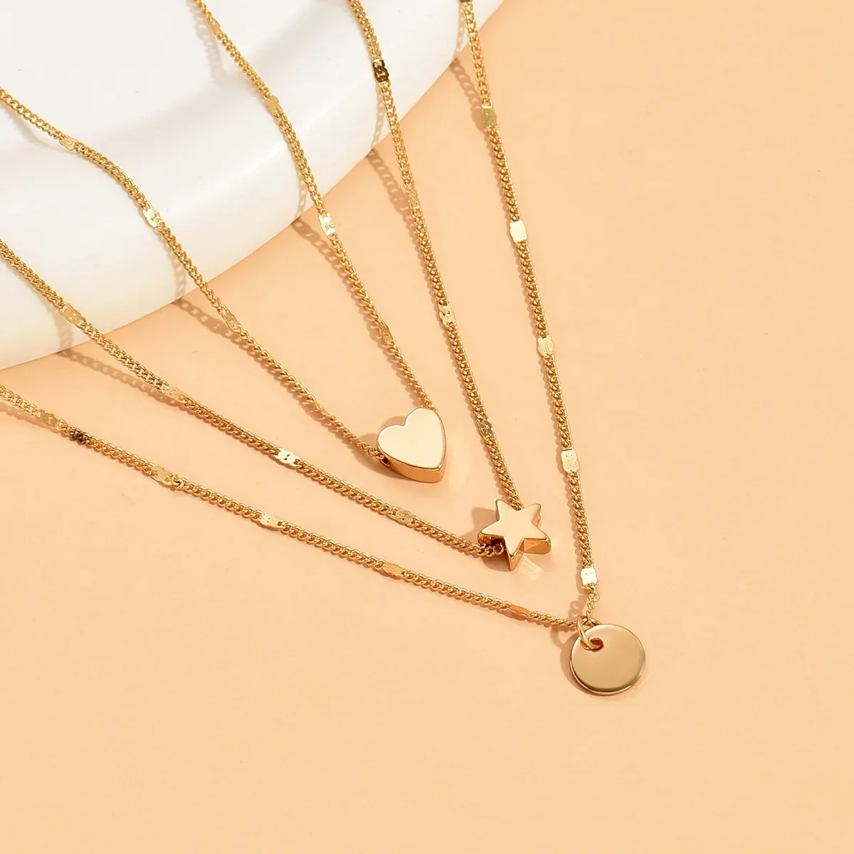 Многослойное ожерелье с подвеской в виде звезды