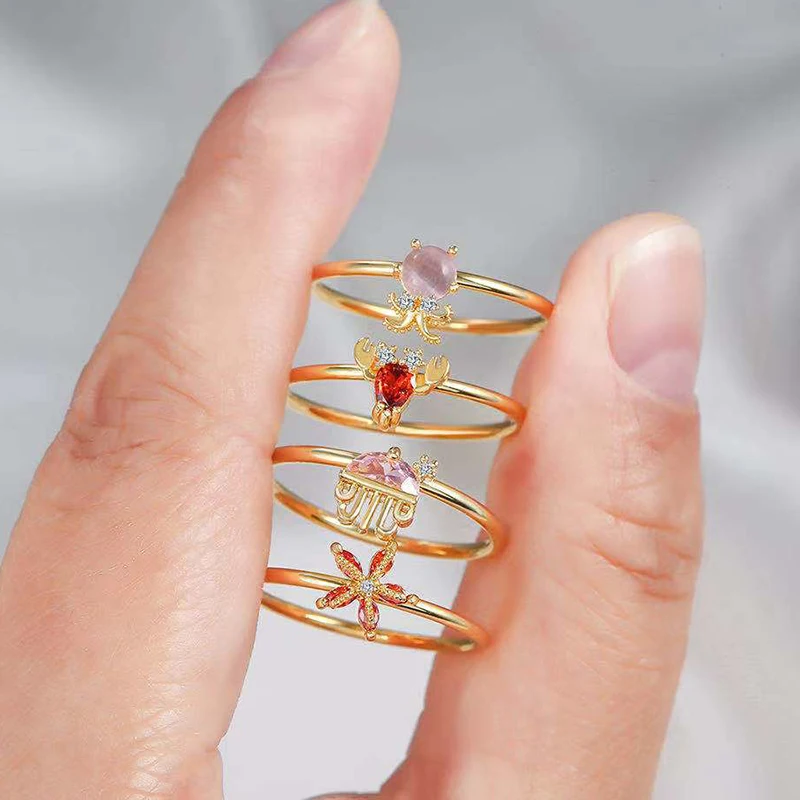 

Изящные позолоченные кольца из серии морских животных для женщин циркониевые милые кольца с золотыми рыбками и морскими звездами класса АА...