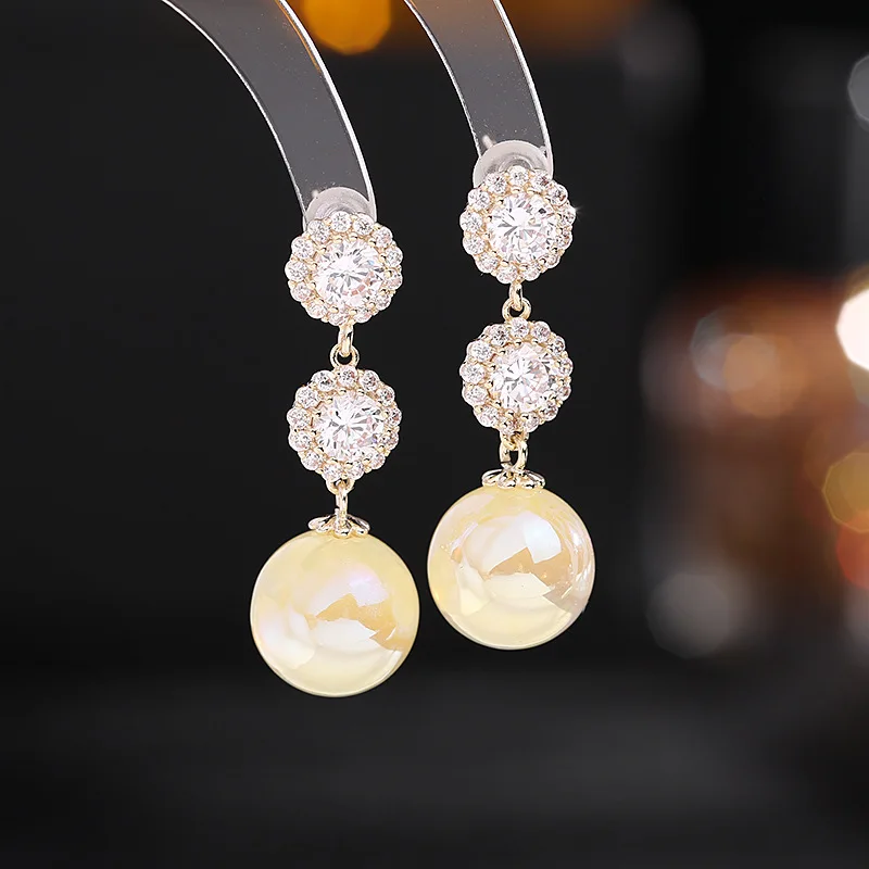 

Niche High-end Temperament Earrings S925 Silver Needle Zircon Inlaid Mermaid Pearl Earrings New Earrings Wholesale Earings