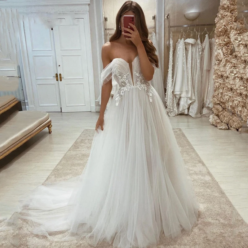 

Sexy Wedding Dresses Off the Shoulder Bride Dress A-Line Applique Beadings Princess Wedding Evening Ball Gown Plus Size