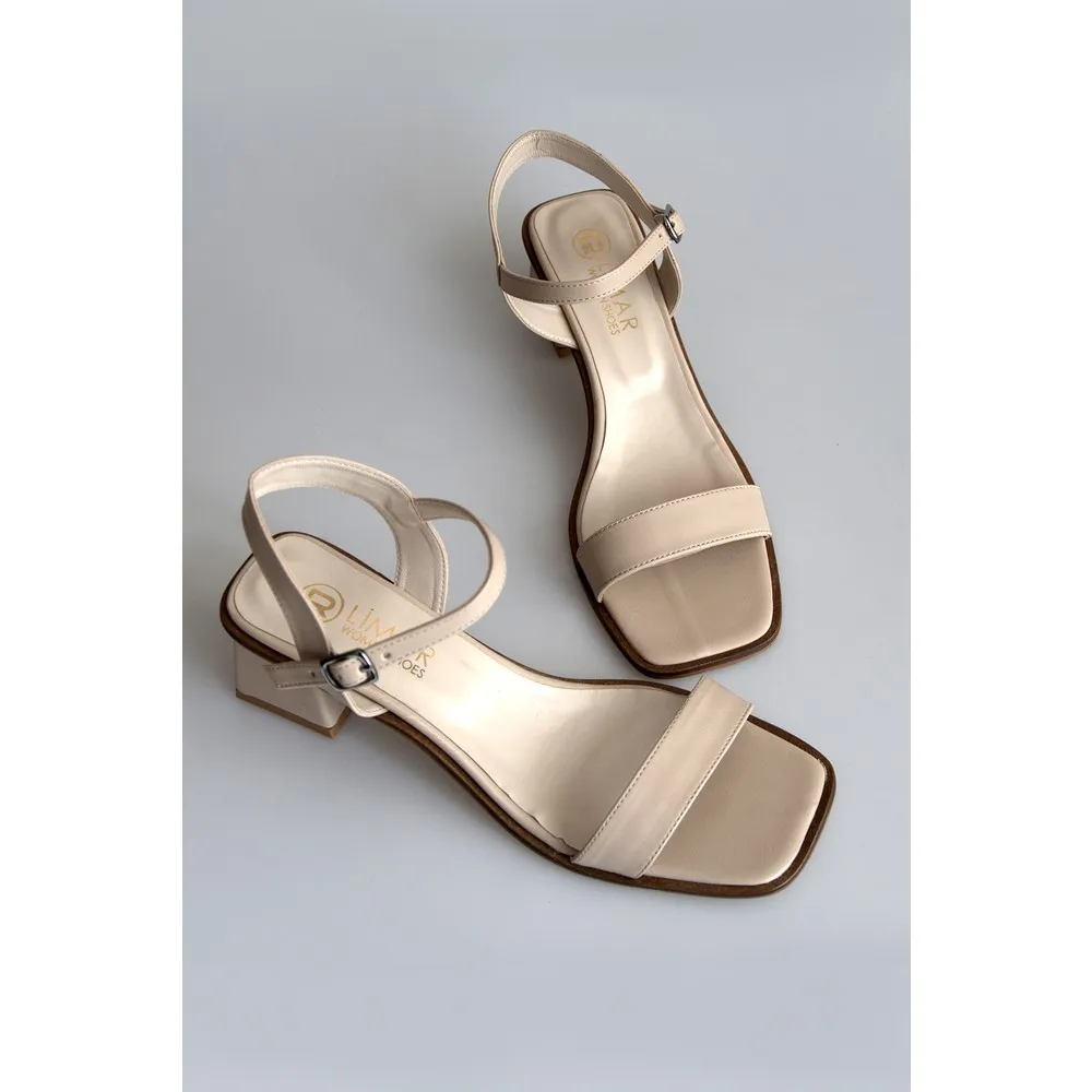

Dorlie Nude Skin Women Heels Single Band Sandals