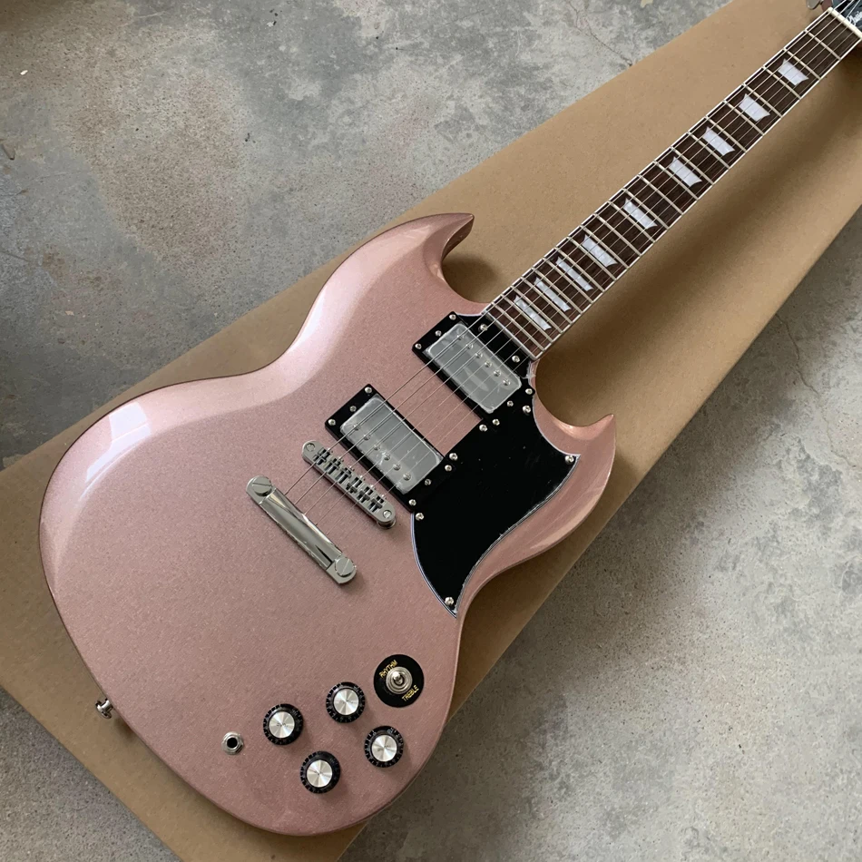 

Rosewood fingerboard electric guitar in Metallic Pink, chrome-plated hardware,Solid mahogany body electric guitar,Free shipping