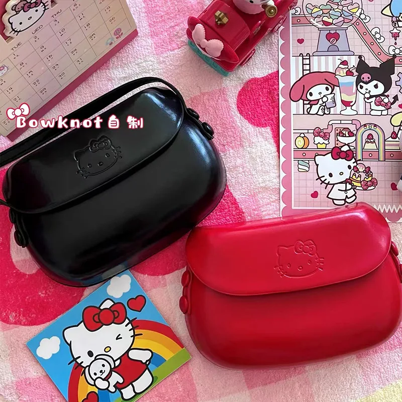 

Sanrios HelloKittys Kawaii retro red all-match simple cartoon cute new oblique shoulder bag mobile phone bag