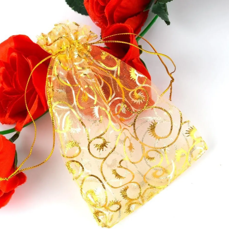 

Подарочные пакеты из органзы золотого цвета