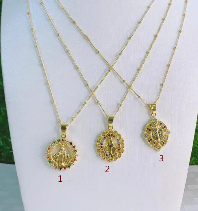 

Кулон в виде Богородицы, с фианитом