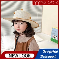 ins childrens straw hat men and women baby sunscreen hat seaside beach hat bayberry ball cute strap windproof straw hat