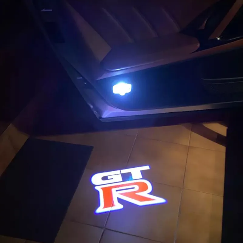 

2PCS LED Car Door Logo Lamp Courtesy Laser Projector For Nissan GTR R35 R34 Welcome Warning Lights Decora Accessories