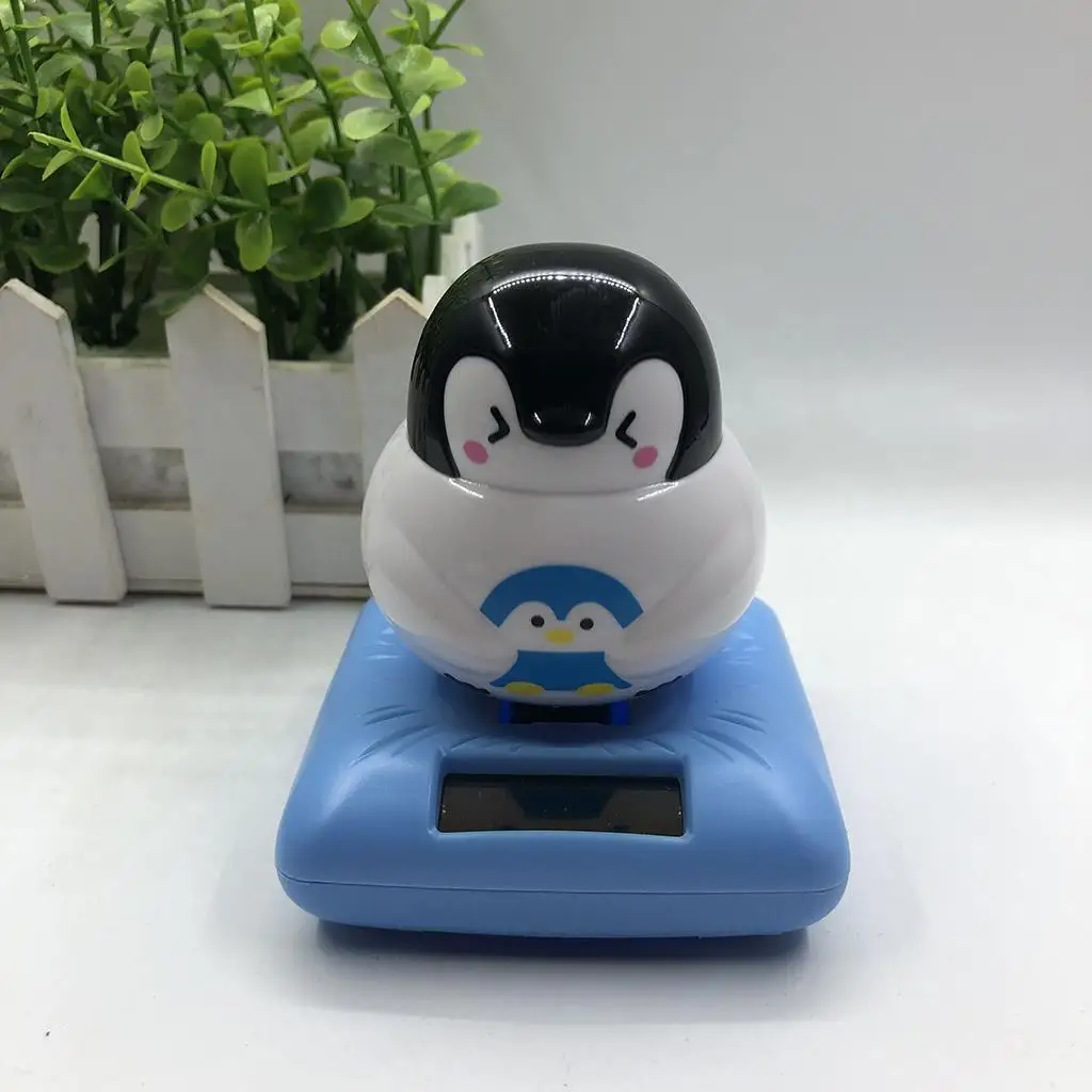 Куклы-пингвины на солнечной энергии танцевальные украшения экологически чистые