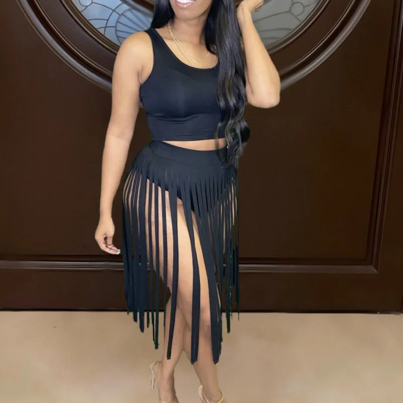 

Новинка, однотонная женская юбка Taeesl, комплект из двух предметов, юбка для ночного клуба и майка, соблазнительные наряды для женщин, укороче...