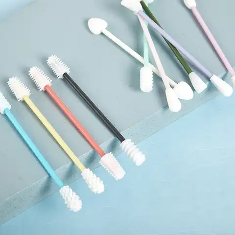 Reusable silicone tampons with a double head to clean the ears and removing cosmetics