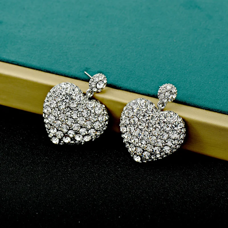 

Exaggerated three-dimensional design women's earrings heart-shaped full diamond shiny high-end 925 silver needle earrings