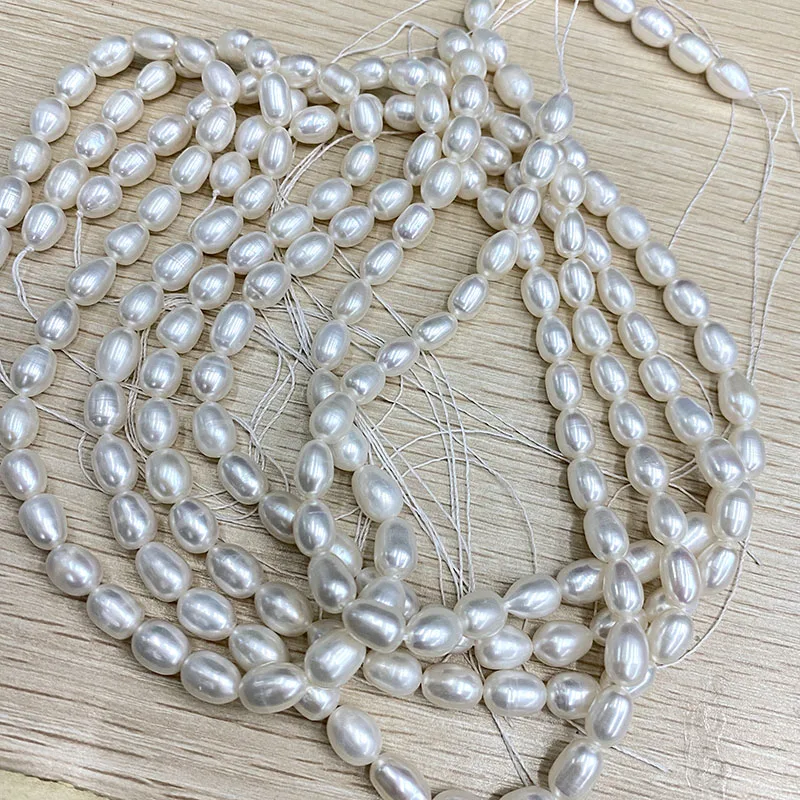Белые жемчужные рисовые бусины 7x10 мм | Украшения и аксессуары