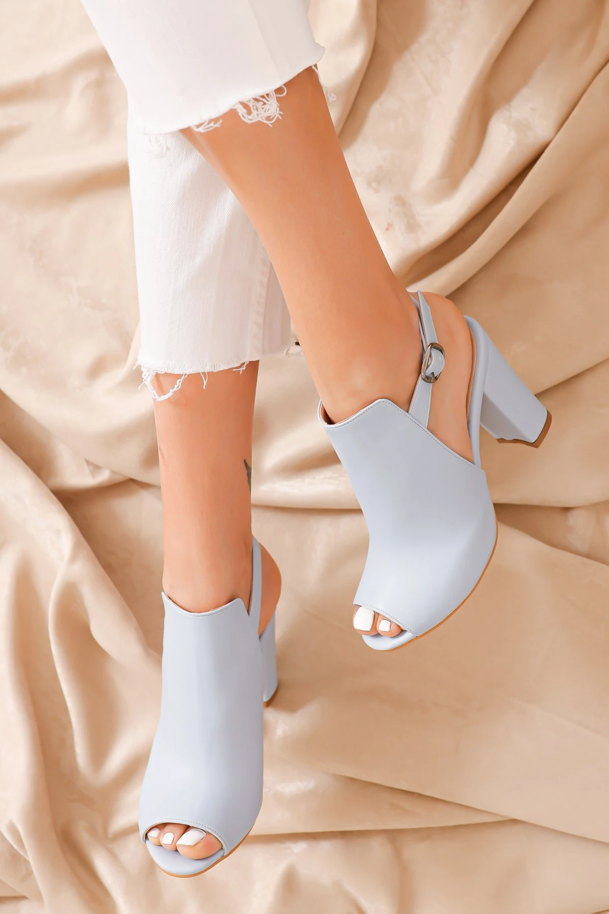 

Quinn-Heeled Bebe Blue Skin Shoes