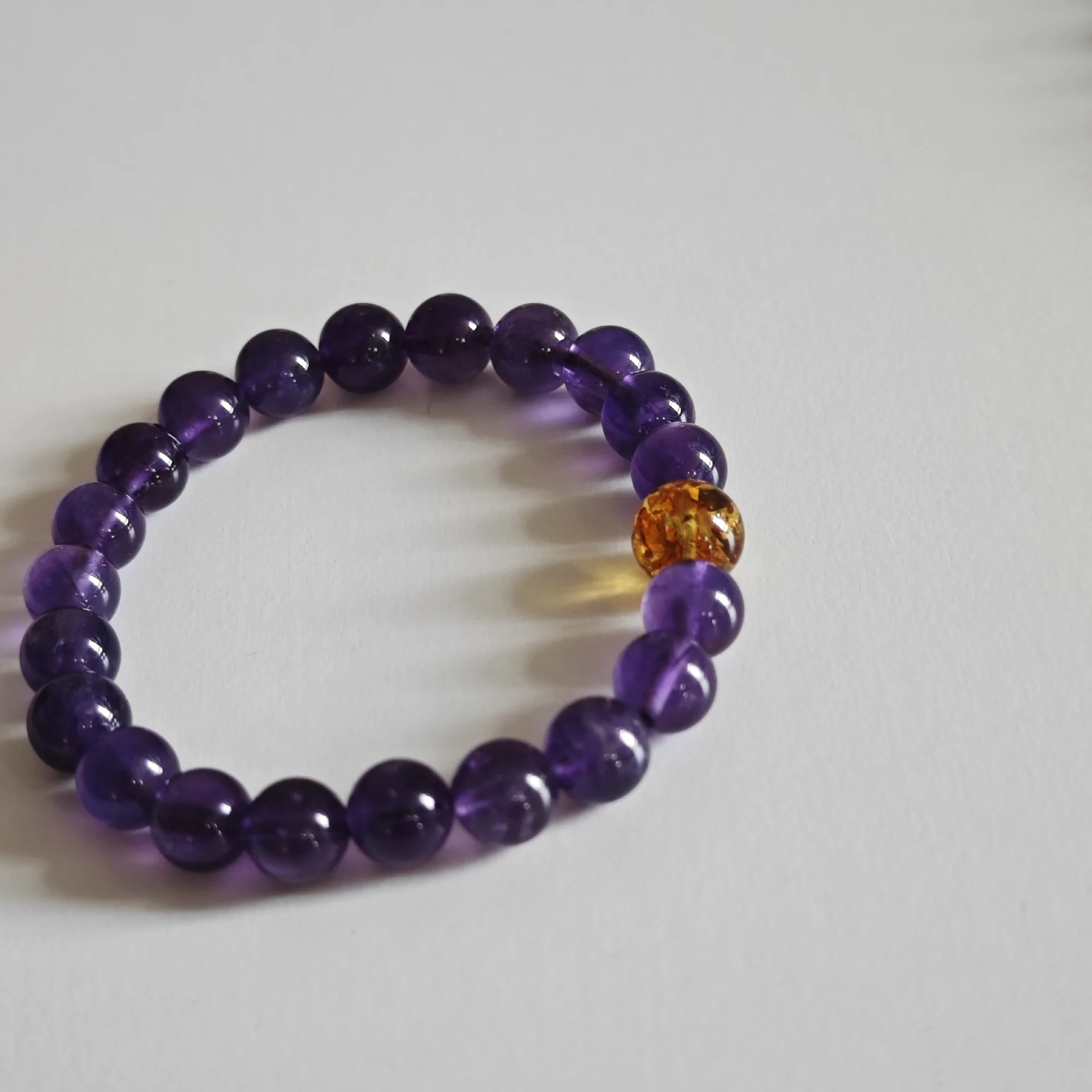 Девять фиолетовых изоляционных огней Уругвайский браслет с аметистом переходка
