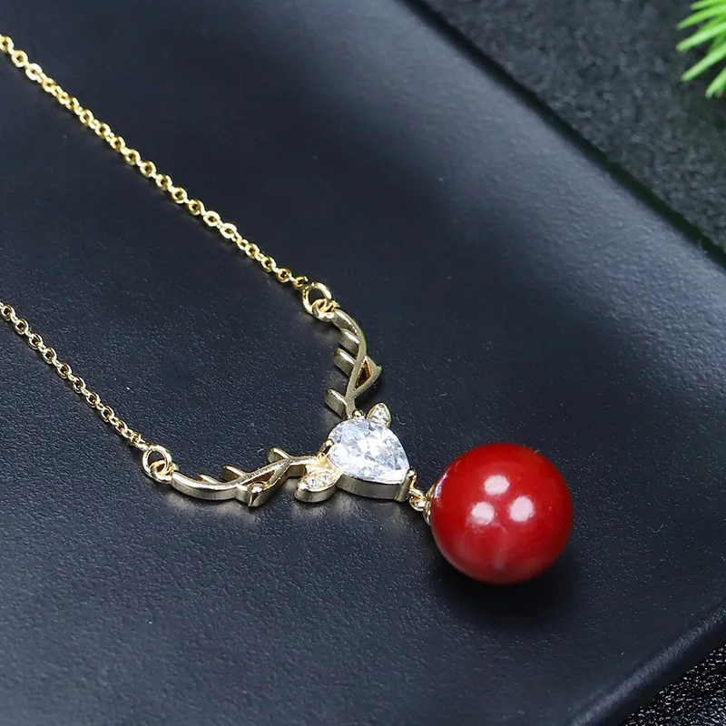 Yilu имеет инкрустированное Cinnabar хрустальное ожерелье женский кулон.