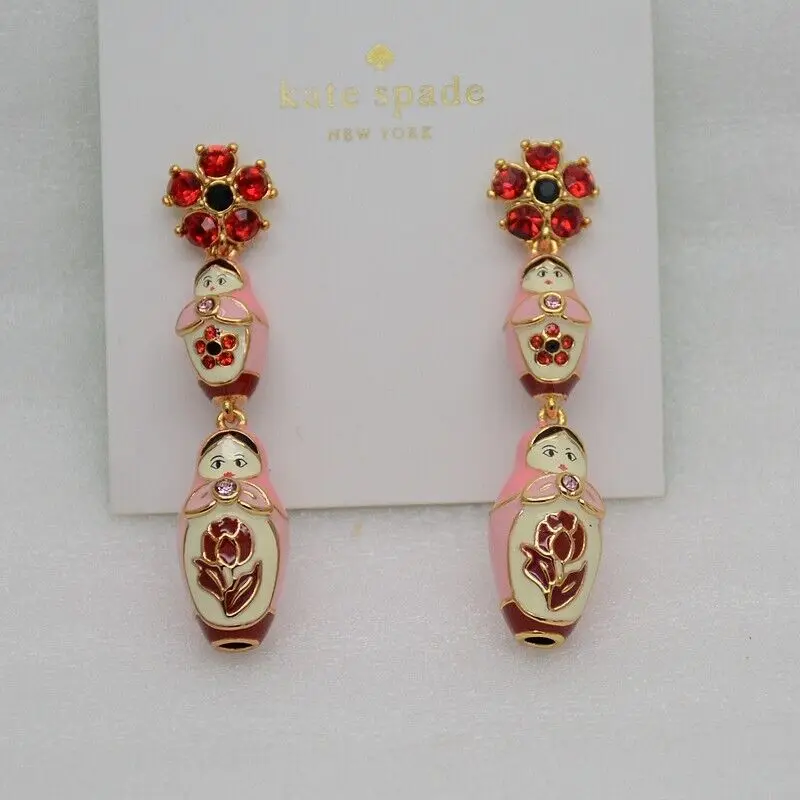 

Ювелирные изделия, позолоченные серьги-кольца с эмалью и кукольным лицом