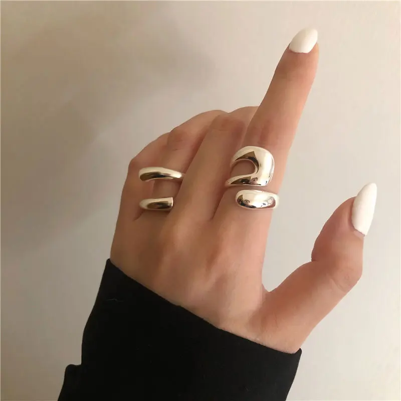 

925 sterling silver ins niche designer high-end crisscross hollowed out fashion personality irregular curve open ring