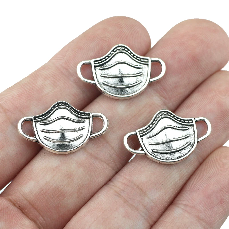 

Newest 20Pcs 14*23mm Antique Silver Color Alloy Gauze Mask Charms Bracelet Connector Pendant Accessory Charms For Jewelry Making