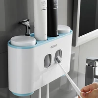 ecoco toothbrush holder auto squeezing toothpaste dispenser wall mount toothbrush toothpaste cup storage bathroom accessories