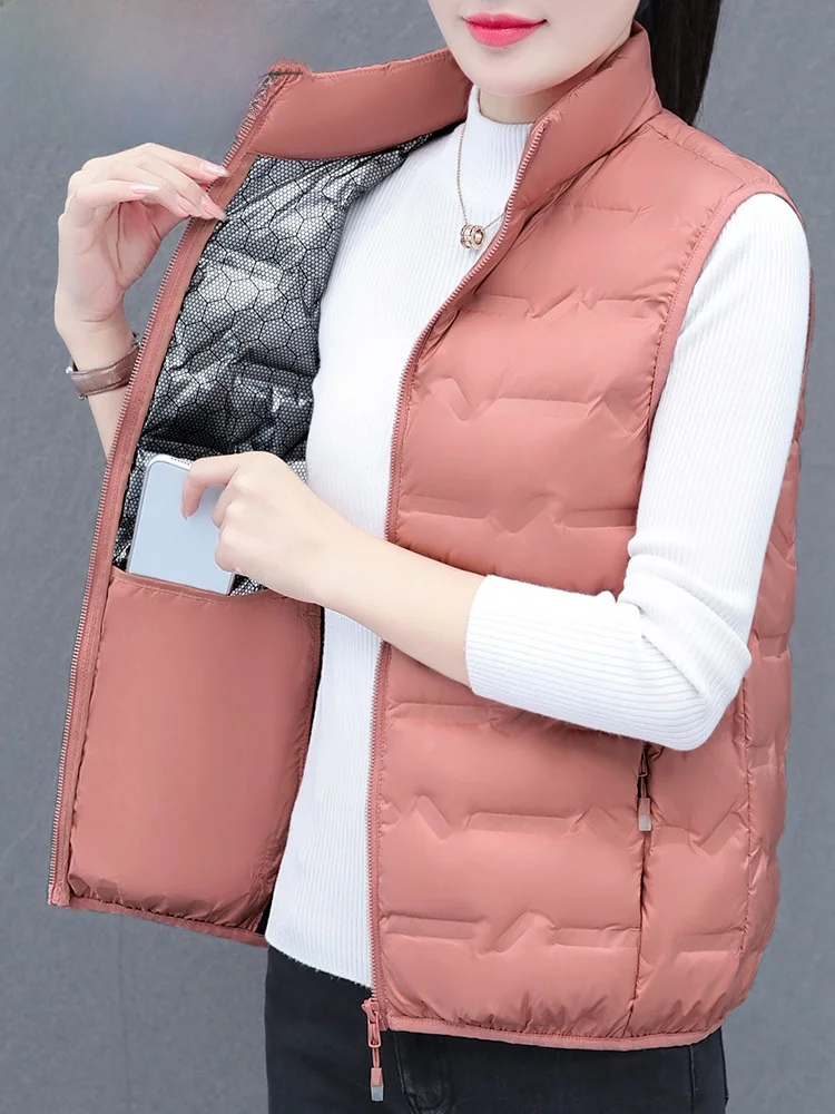 Пуховой женский жилет Woodpecker новинка 2024 зимний легкий теплый на белом утином пуху