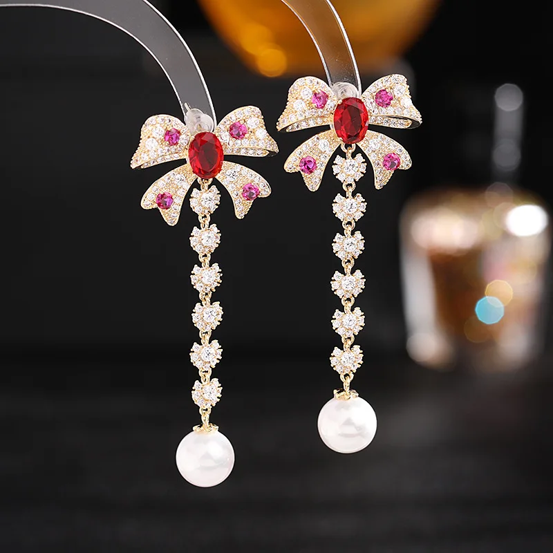 

High Quality 925 Sterling Silver Elegant And Exquisite Butterfly Knot Pearl Ear Studs Earrings For Women Fashion Jewelry LE219