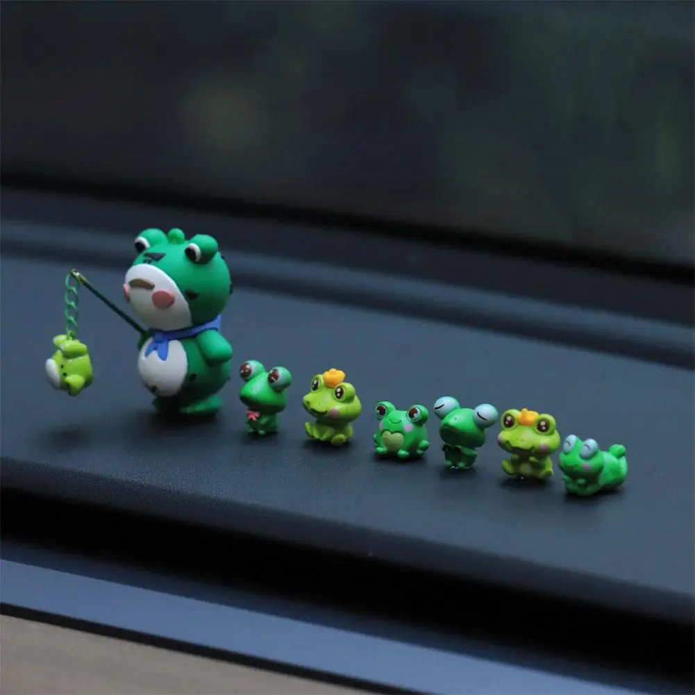 

Миниатюрная светящаяся лягушка для автомобиля серебристого цвета