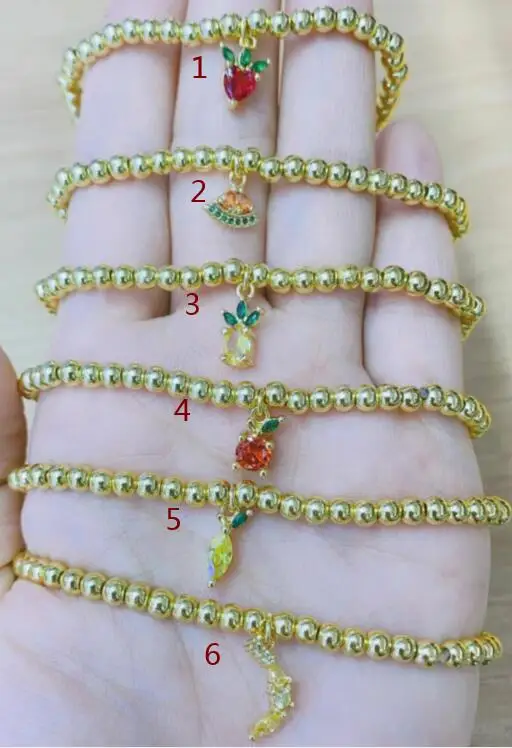 

Медный микро-выложенный фианит манго клубника банан позолоченные бусины эластичная нить кулон в виде ягоды браслет для девушек женщин пода...