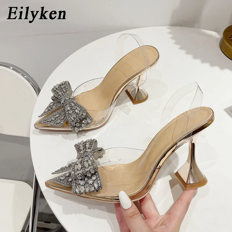 

Eilyken Summer PVC Transparent Pointed Toe Women Pumps Fashion Crystal Rhinestone Butterfly-knot High Heel Ladies Sandals